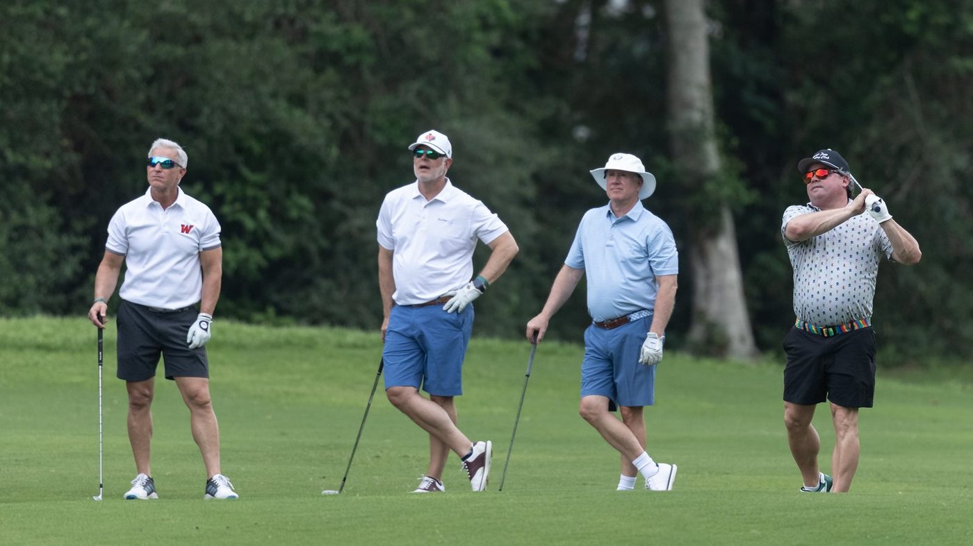 M. Atnipp on the golf course with friends after his hip replacement